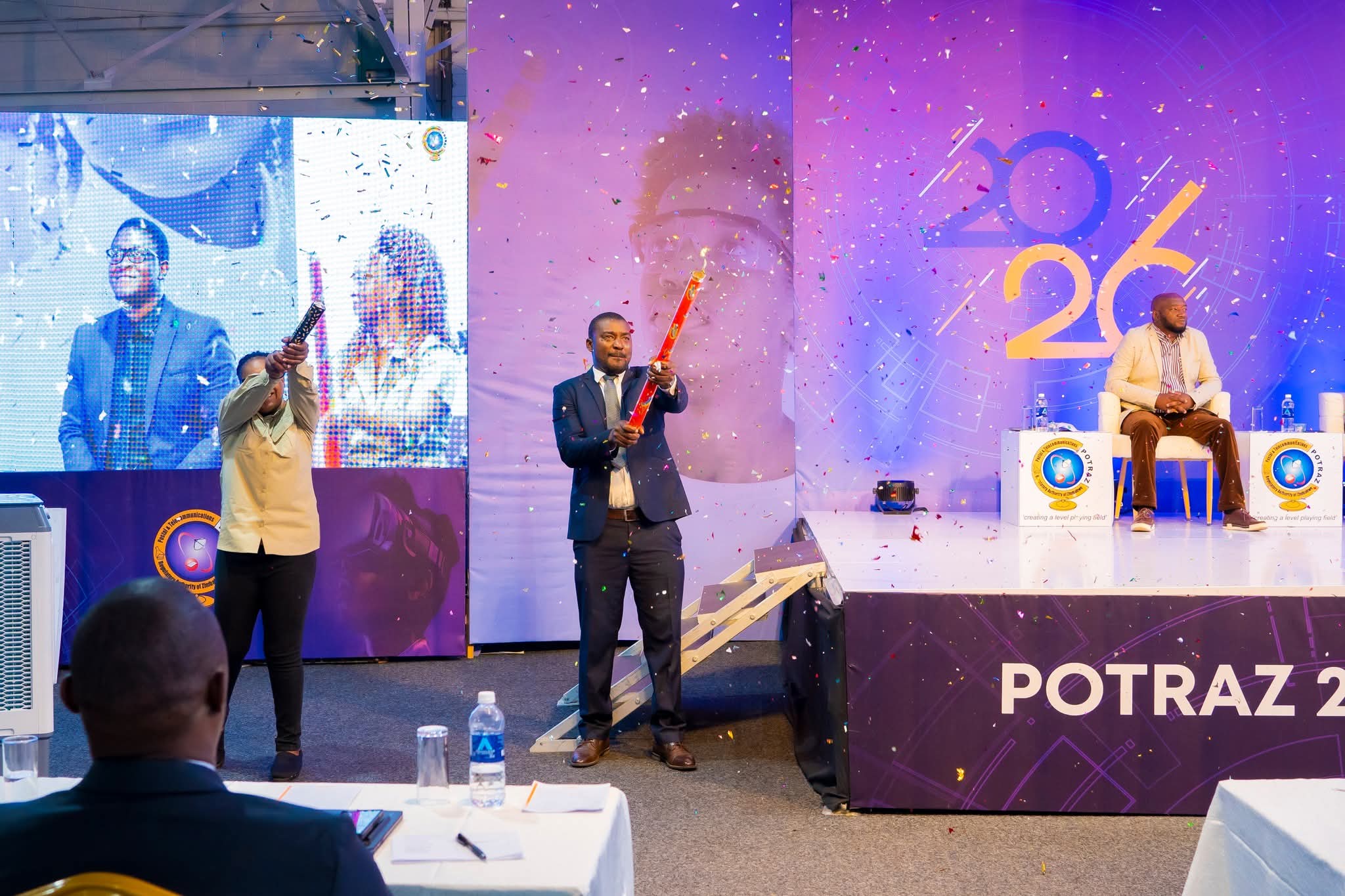 POTRAZ 2026 stage celebration with confetti and branded backdrop
